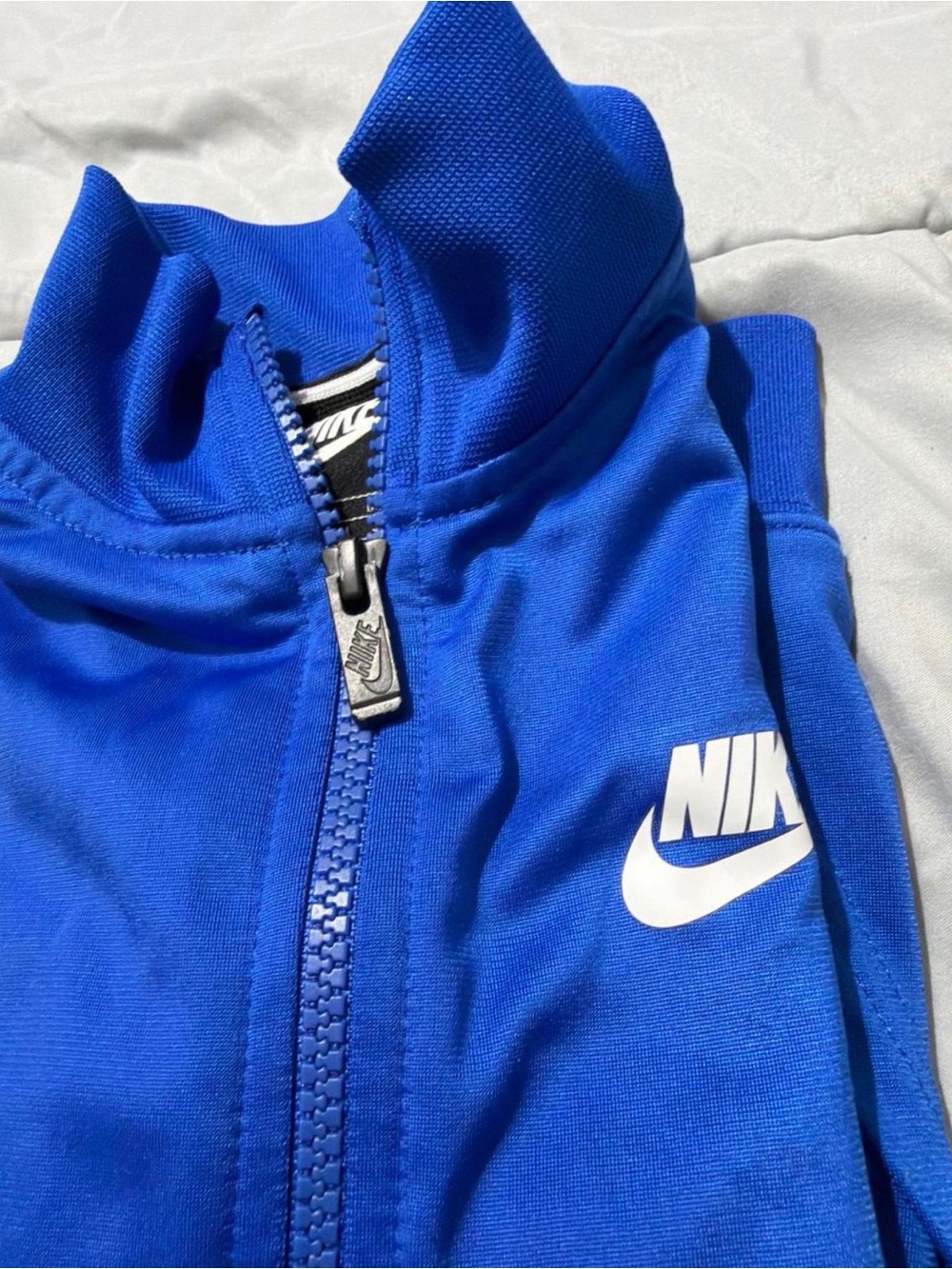 Nike Bright Blue Track Jacket with White Swoosh